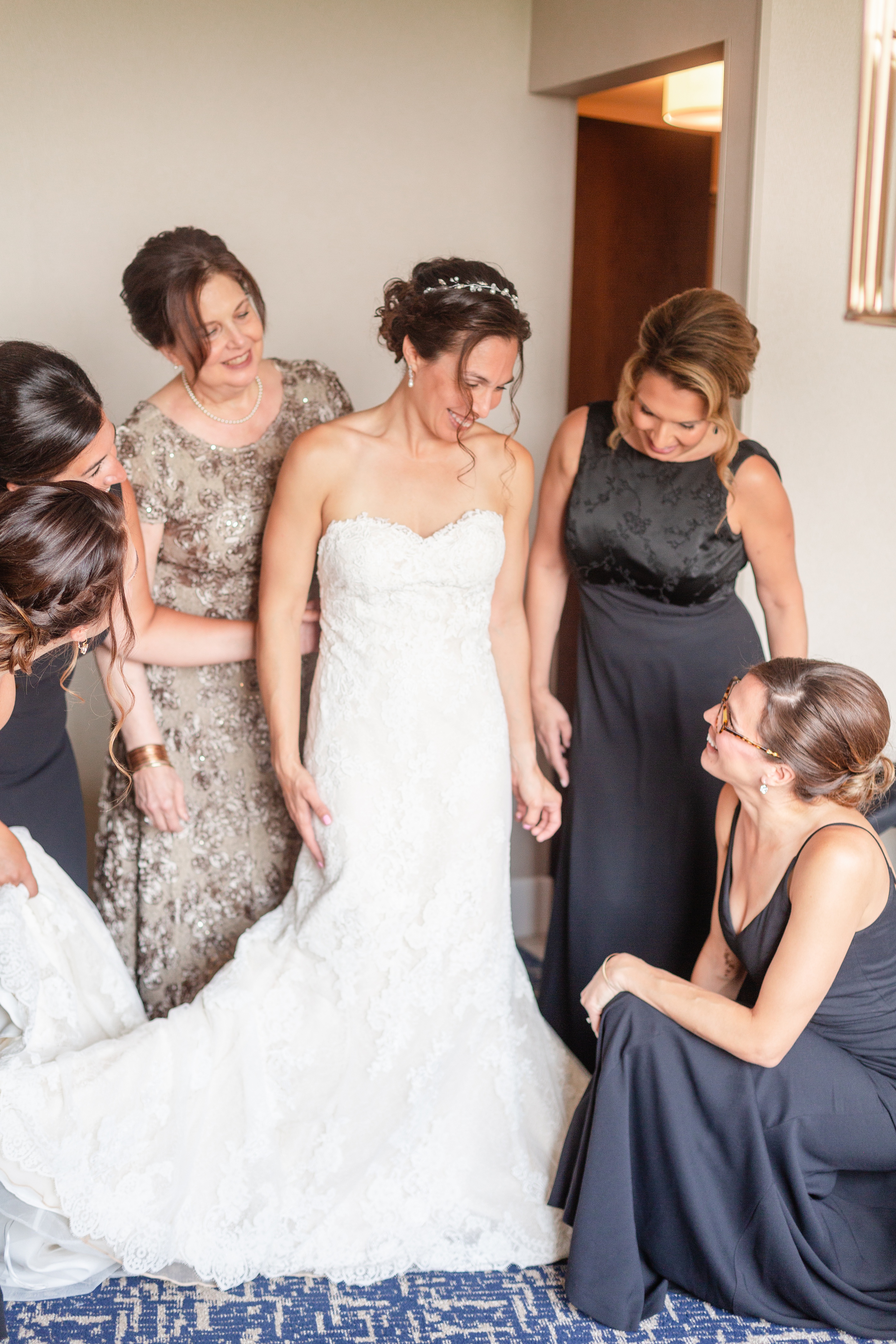 Bride with mother and bridesmaids